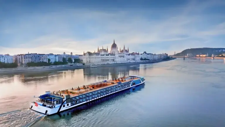 River cruise ship on the Danube near the Hungarian Parliament in Budapest