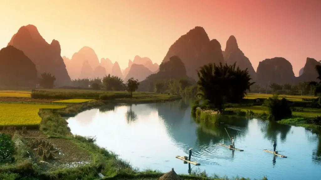 Bamboo rafts on a river among karst mountains in China