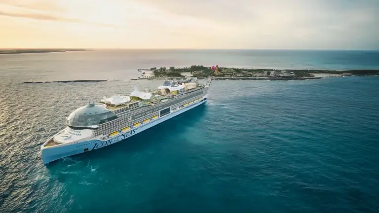 Cruise ship approaching a tropical island in the Caribbean