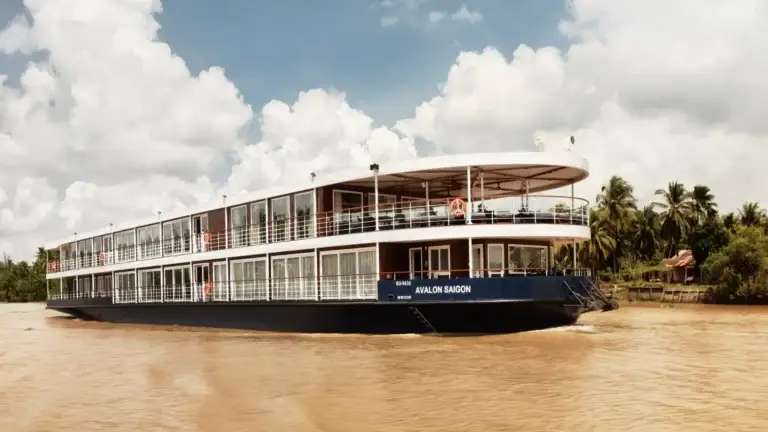 River cruise ship on a wide tropical river