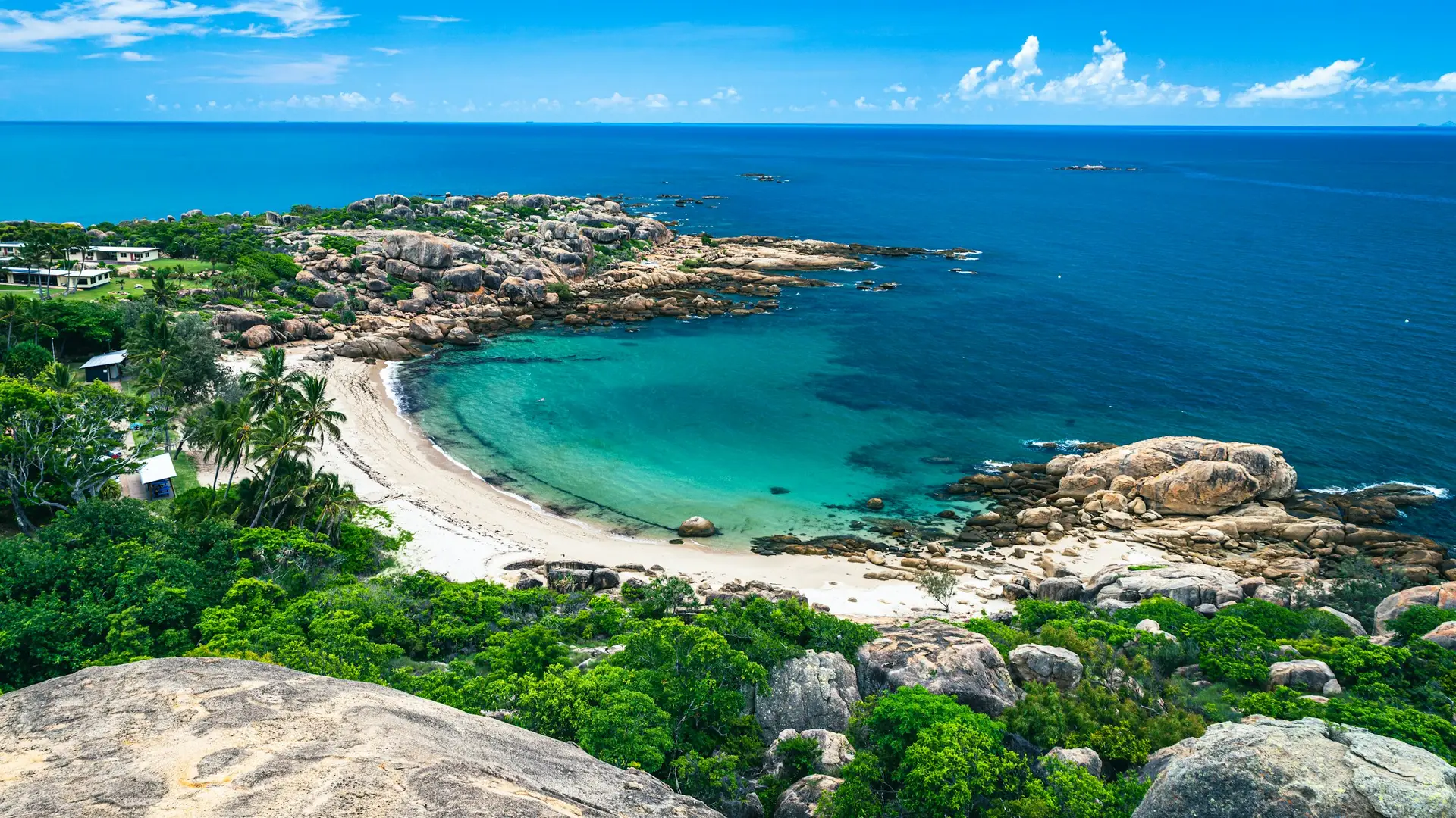 Aerial view of a turquoise cove and beach in Bermuda