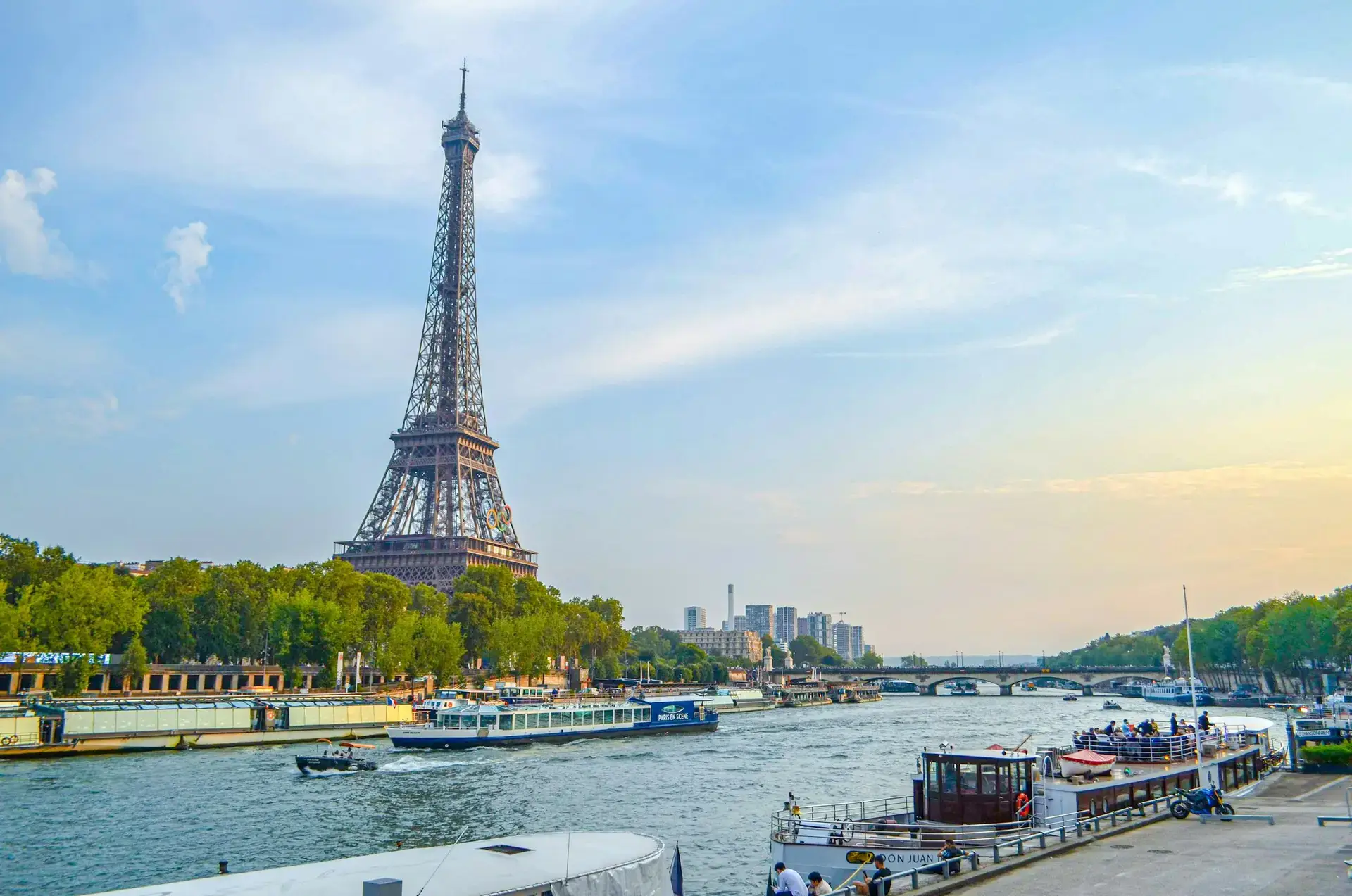 Eiffel Tower and the Seine River with boats, Paris